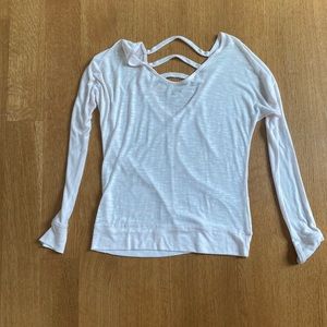 Pink yoga shirt with open back detailing